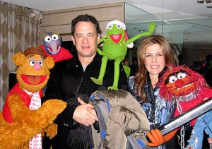 The guy who plays Woody, with some Muppets.