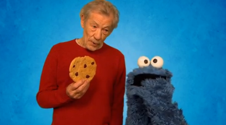 Sir Ian McKellen Teaches Sir Cookie Monster “Resist”