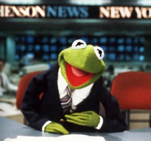 Kermit wearing a suit, like adults do