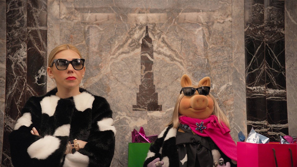 Miss Piggy Shows Off Her Elevator Fashion for Kate Spade