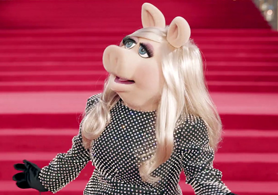 Miss Piggy Reads Vogue Paris, Wears a Fancy Dress