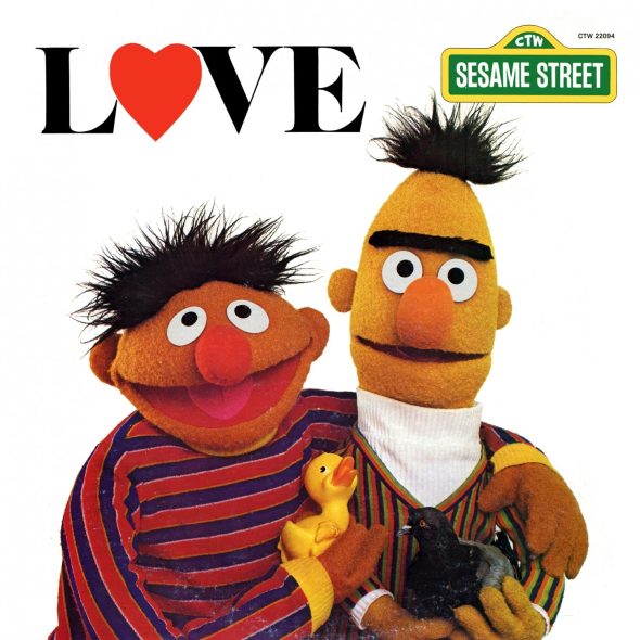 The cover of the Sesame Street LP "Love," featuring Ernie and Bert. Ernie is holding Rubber Duckie in one hand and Bert is holding a pigeon. Ernie's other arm is around Bert.