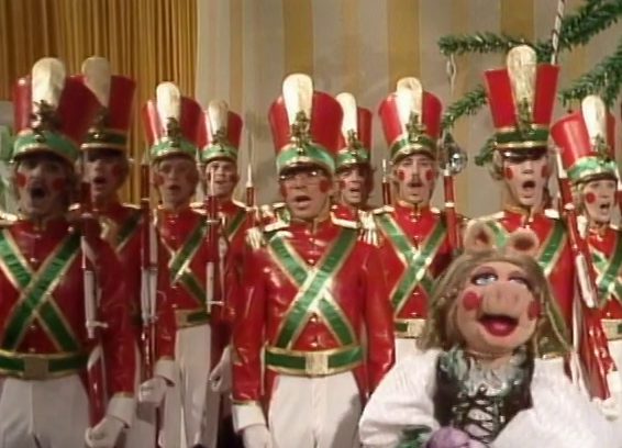 An army of toy soldiers, featuring John Denver.