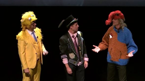 Matt Vogel dresses as a Birdketeer, Eric Jacobson dressed as a Grouchketeer, and Martin P. Robinson dressed as a Snuffketeer.