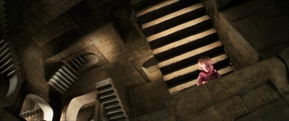 Screenshot from Labyrinth: Baby Toby in the Escher 'Relativity' stairs room.
