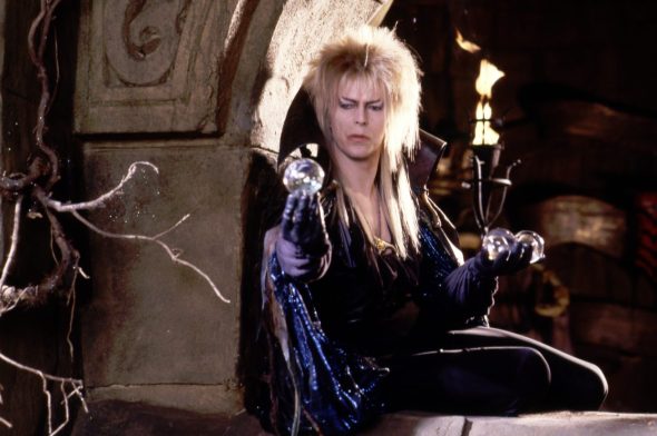 Screenshot from Labyrinth: David Bowie blowing a crystal ball bubble.