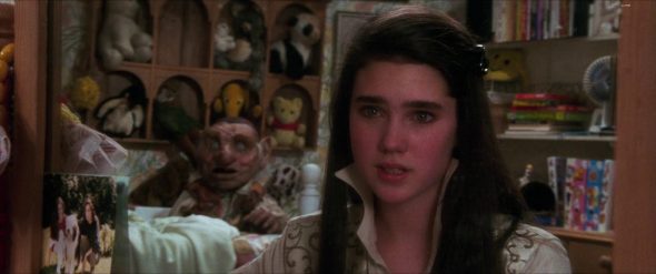 Screenshot from Labyrinth: Sarah sees Hoggle in her mirror.