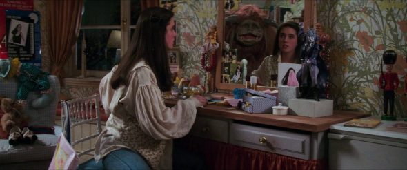 Screenshot from Labyrinth: Sarah sees Ludo in her mirror.