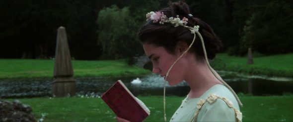 Screenshot of Labyrinth: Sarah, in the park, reads a line from her play, The Labyrinth.
