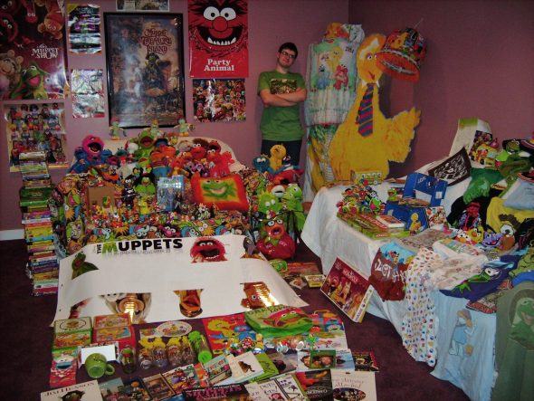 An old photo of J.D. (that's me) with my Muppet stuff collection taking up an entire room.