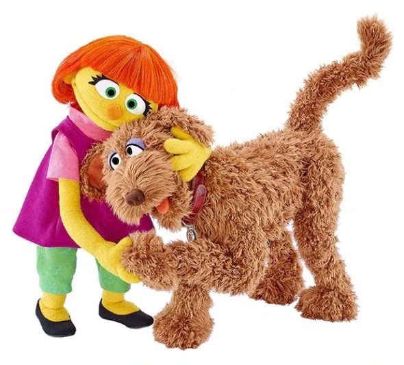 Sesame Street's Julia and her dog.