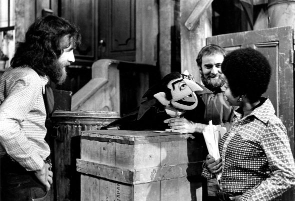 Jim Henson watches Jerry Nelson perform The Count talking to Loretta Long