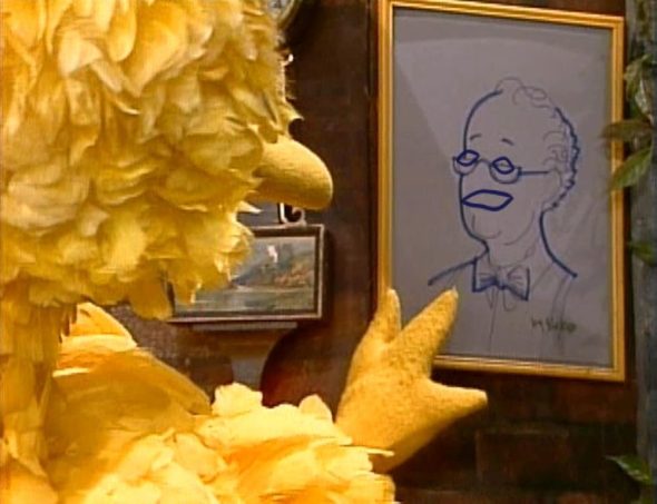 Big Bird looks at his picture of Mr. Hooper, only Mr. Hooper's face has been replaced by Limbo's.