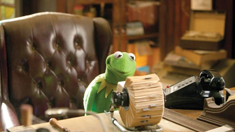 Kermit going through his Rolodex of celebrity friends in The Muppets (2011).