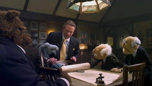 Tex Richman revealing his evil plan to Uncle Deadly, Bobo, Statler, and Waldorf in The Muppets (2011).